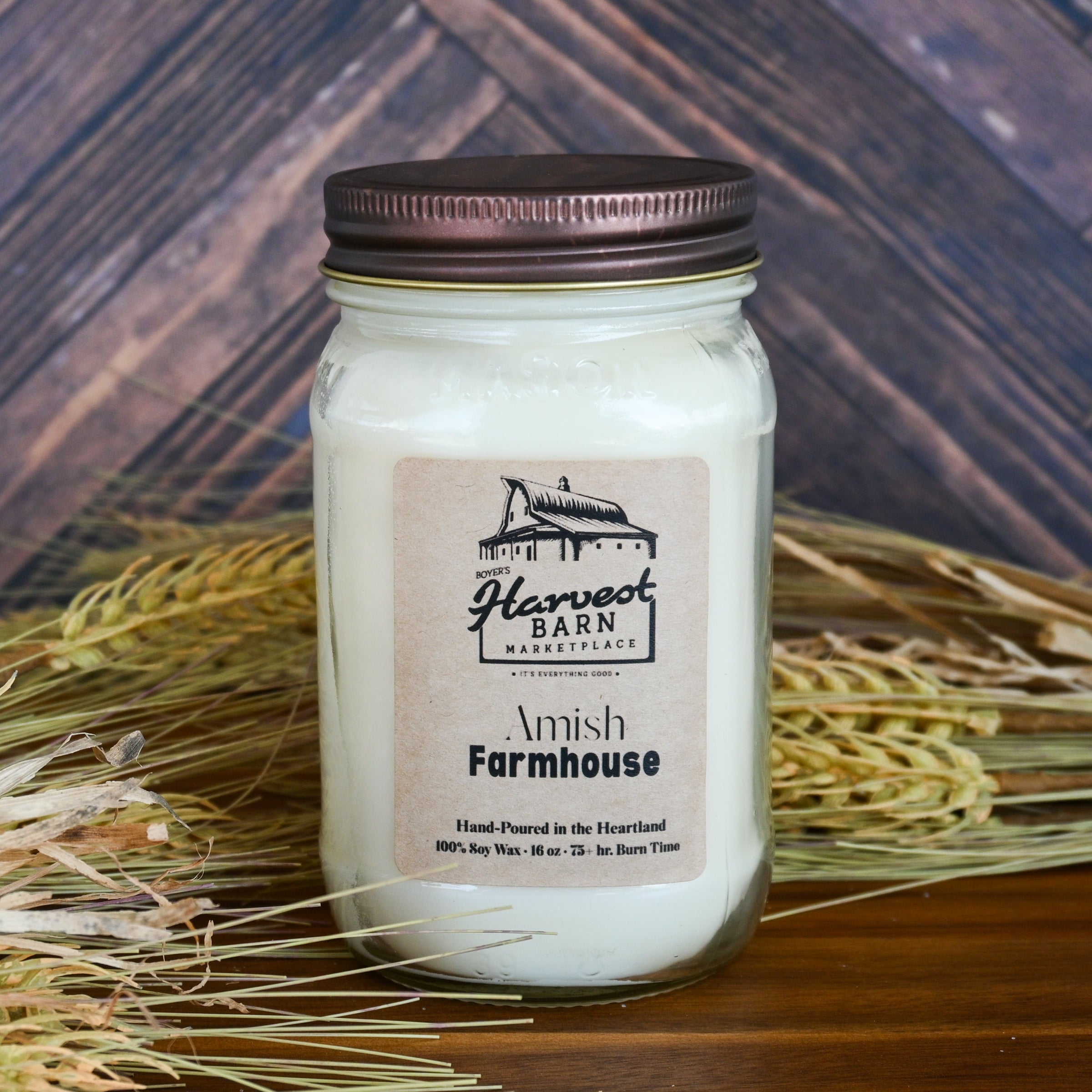 a candle on a wooden table