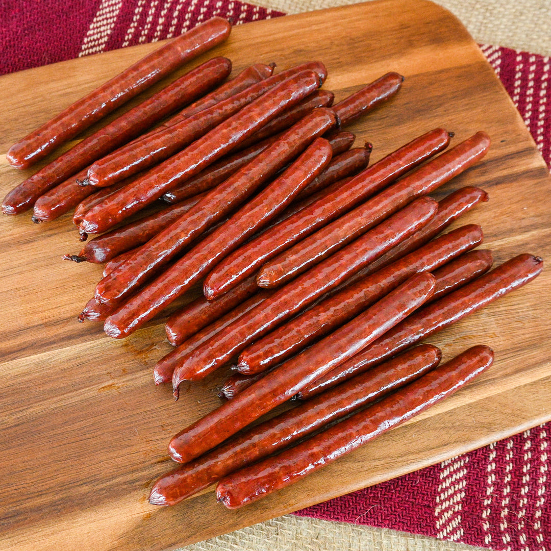 Beef Sticks On Cutting Board