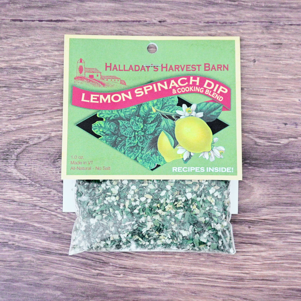 Packaged lemon spinach dip blend with Halladay's Harvest Barn branding on a wooden surface.