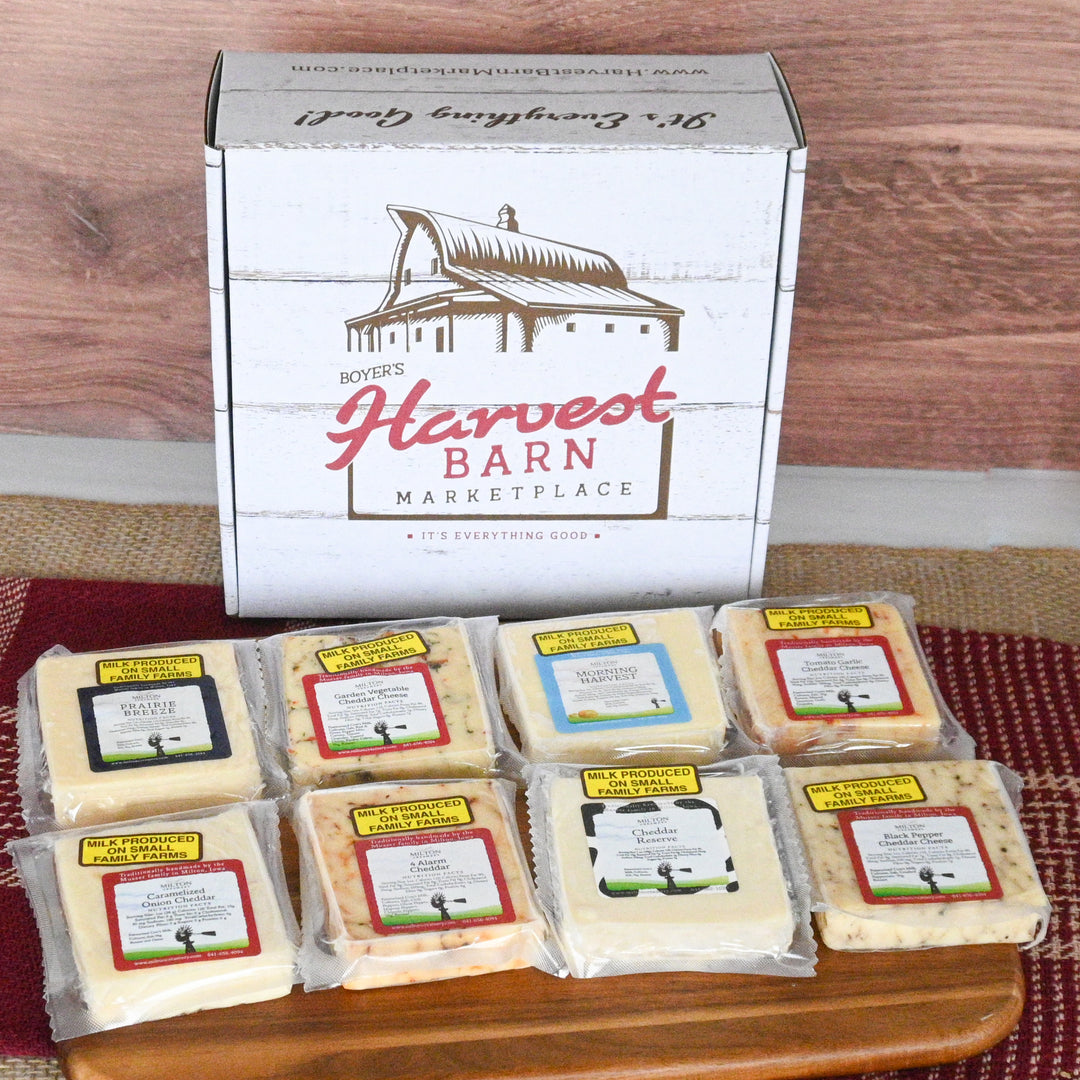 Harvest Barn Gift Box with Eight Milton Creamery Cheeses in front of it
