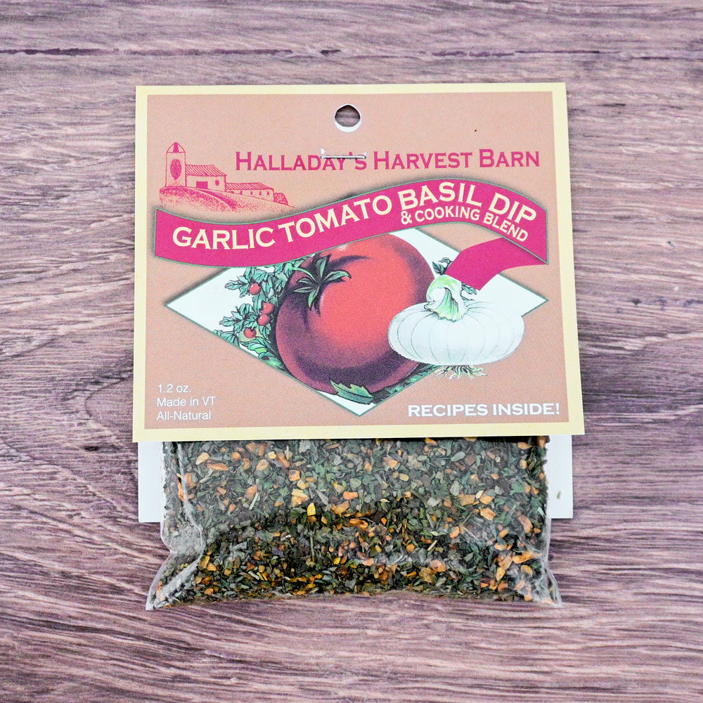 Garlic tomato basil dip blend packaging on a wooden surface