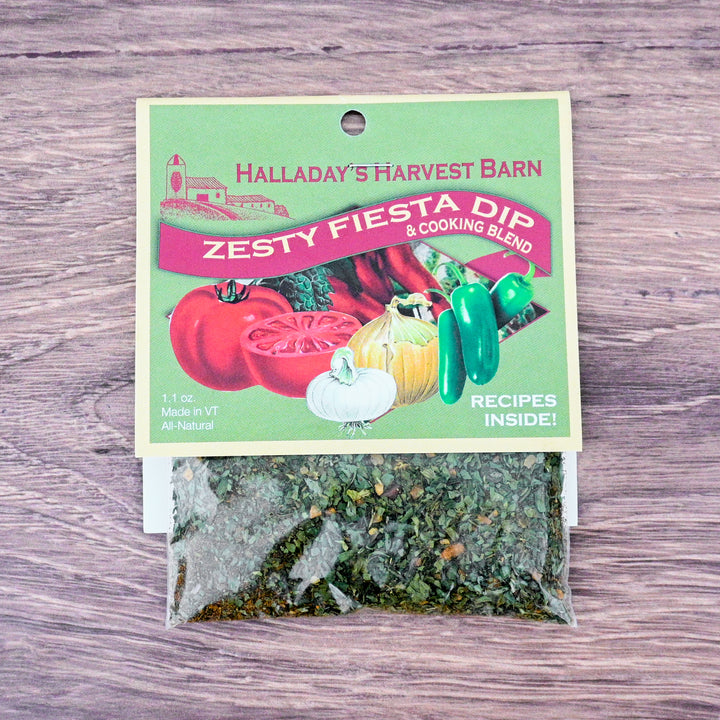 Packaged Zesty Fiesta Dip & Cooking Blend from Halladay's Harvest Barn on a wooden surface